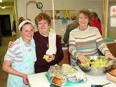 Vacation Bible School Lasagne dinner being served at the Collbran Congregational Church in Collbran Colorado